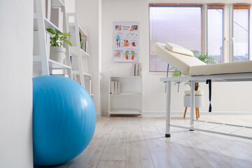 Canvas Print - Interior of rehabilitation center with couch and shelf units