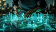 © Sippung - Planner's hands manipulating a 3D holographic model of a smart city complete with glowing traffic patterns