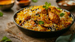 Chicken biryani served with fragrant steamed basmati rice, a gourmet delight
