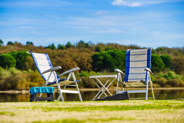 Canvas Print - Two empty camp chairs on nature