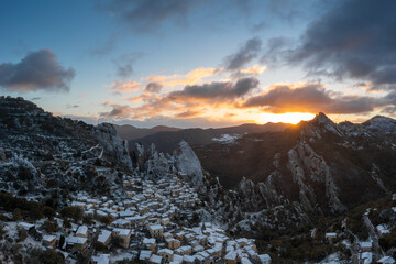 Wall Mural - drone view of Castelmezzano at sunrise in winter