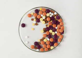 Wall Mural - Petri dish with pills.