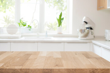 Wall Mural - empty beautiful wooden table top and blurred modern kitchen interior background