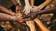 © CozyDigital - Photo of hands of diverse people unity. No racism and unity of different people concept