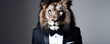 Surrealistic black and white portrait of a lion with a human body dressed in a formal tuxedo and bow tie, rendered in monochrome. Boundaries between the animal kingdom and human social norms