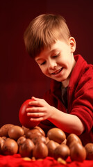 Wall Mural - 16:9 or 9:16 Cute boy playing with eggs on Easter day.for backgrounds screens greeting card or other High quality printing projects.