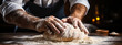 © alexkich - Making dough by hands at bakery