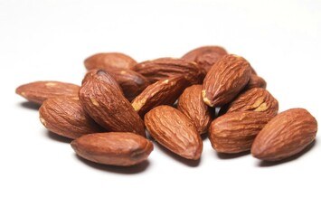 Wall Mural - almonds on white background