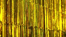 Party Background. Decor Made Of Gold Foil, Tinsel And Candy. Festive And Cheerful Mood 