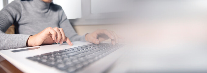 business woman hands typing on laptop computer keyboard