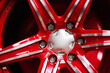 new alloy car wheel closeup, red color
