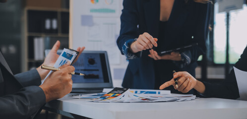 Close up ux developer and ui designer use augmented reality brainstorming about mobile app interface wireframe design on desk at modern office.Creative digital development agency