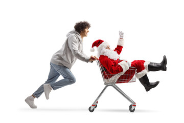 Poster - Guy running and pushing Santa Claus in a shopping cart