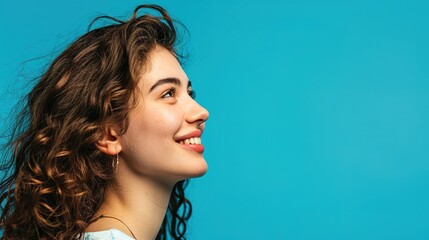 Sticker - Profile side view portrait of attractive cheerful girl demonstrating copy space ad new isolated over bright blue color background