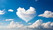 A cloud in the shape of a heart, background of a sky full of clouds