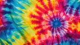 Fototapeta Tęcza - Abstract colourful tie dye textile texture background. Retro, hippie and boho style banner