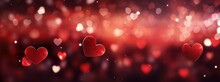 Abstract Valentine's Day Background With Red Hearts And Blurred Bokeh Lights. Festive Love Concept Banner