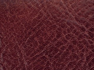 Wall Mural - Texture of leather surfaces of buffalo leather material for sewing bags and clothes in red