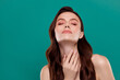 Photo of adorable seductive woman nude shoulders hand neck closed eyes empty space isolated green color background