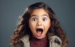 cute little girl shocked on isolated background