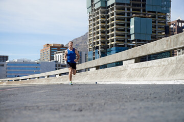 Poster - Man is running on bridge, fitness and cardio outdoor for health and training for marathon. Exercise in city, runner with speed and energy, sports and athlete on urban street for race and endurance