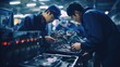 Photo of asian workers working at technology production factory with industrial machines and cables building electronic smartphones