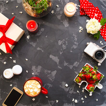 Flat Lay With Present, Candles, Cofffee And Red Ribbon
