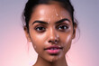 Close view of young indian female face with water drop
