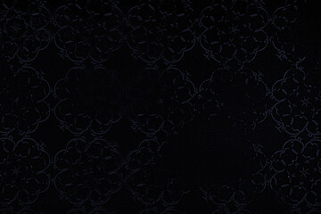 black background with floral ornament