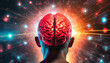 The red brain in a person's head has connections to the outside world with multi-functional devices,the universe and stars in a background.Rear view.