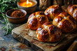 Hot cross buns are sweet buns with raisins, decorated with a cross on top