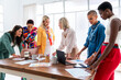© oneinchpunch - Group of businesswomen meeting in the office