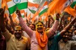 Indian people celebrating India's independence in the streets with flags and covered in color
