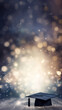 © Distinctive Images - Graduation Cap on a Sparkling Bokeh Background for Poster, including open empty copy space for text