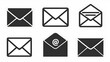 Set of simple mail symbols, monochrome, for web and print. Assortment of flat design email icons, black and white theme. Collection of email icons, black on white design. Black and white envelopes