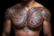 © mila103 - Tattooed man with a pattern on his body and a black background