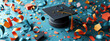 A black graduation cap lies amongst a sea of colorful confetti, capturing the essence of graduation celebrations.