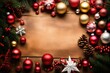 Christmas frame of spruce, red & gold christmas decorations on