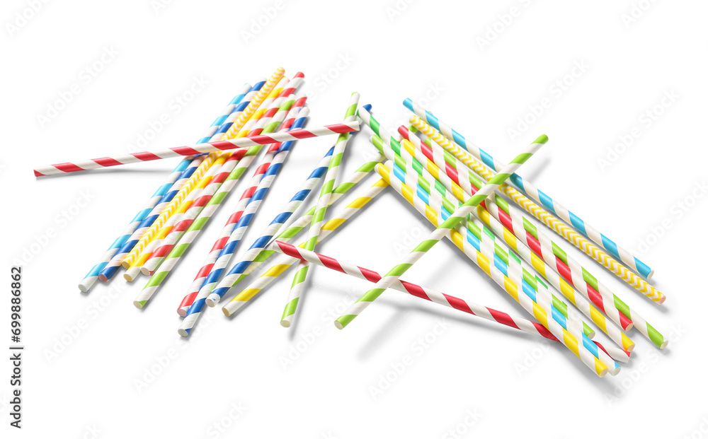 Different paper drinking straws on white background