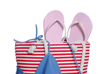 Sticker - Beach bag with flip flops and bikini top isolated on white