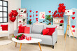 © Pixel-Shot - Interior of modern living room decorated with hearts and balloons for Valentine's Day celebration