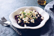 Healthy salad with beet root, feta cheese and parsley