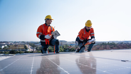 Canvas Print - Engineering technician is professional trained in skills and techniques installing solar photovoltaic panels system on power industrial factory roof, Engineering concepts to good environment.