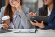 © NanSan - Two Asian businesswomen working together, meeting and discuss of new business project, professional people.