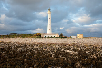 Wall Mural - San Vito Lo Capo Lighthouse is an active lighthouse located on the west coast of Sicily near Trapani. Italy.
A beautiful sunny day by the seashore. An active holiday.