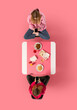 © Lustre Art Group  - Creative collage. Two young woman, friends sitting at Asian cafe and eating delicious food while speaking against pink background. Concept of business lunch, morning meeting, briefing. Ad