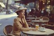 A timeless retro photograph captures the allure of a female seated at a Parisian café table in the 1960s. The scene exudes a classic charm, depicting an era of grace, fashion