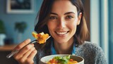 Fototapeta Nowy Jork - Young woman eating healthy food