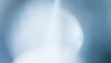 Wall Mural - Light Glare in the Glass. Loop. The light passes through the facets of a slowly rotating diamond and creates repetitive sparkling highlights and rainbow colors