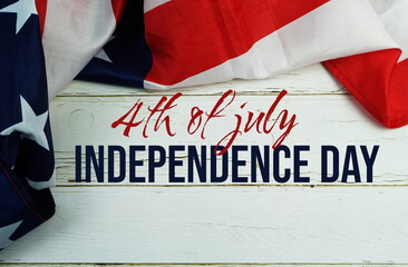 Wall Mural - Happy Forth of July Independence Day text messege  with USA flag on wooden background